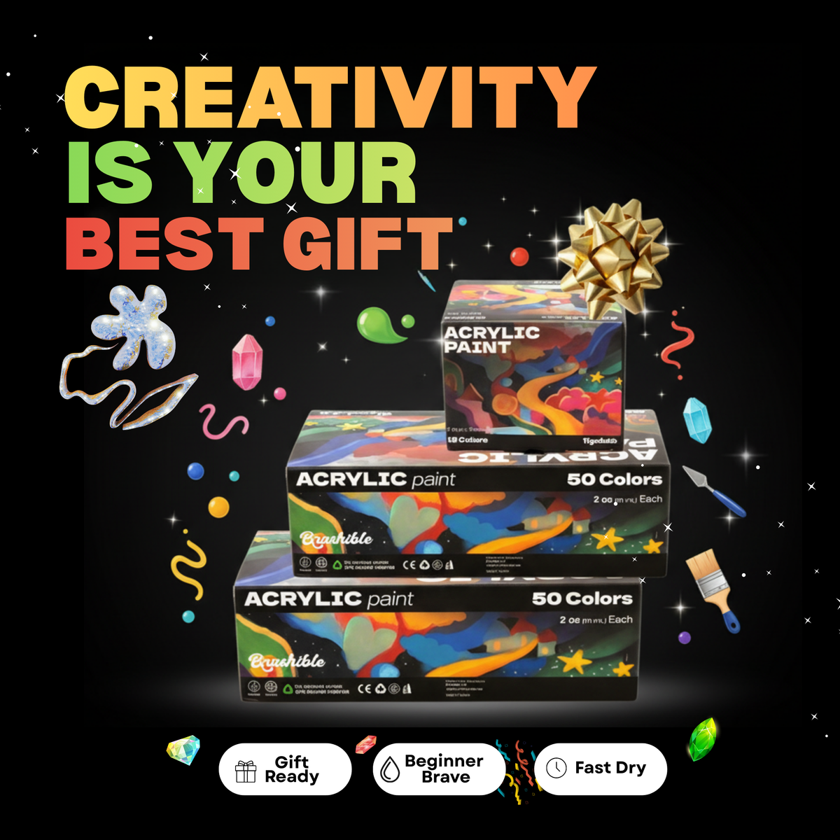 Stack of Brushible acrylic paint set boxes with a gift bow