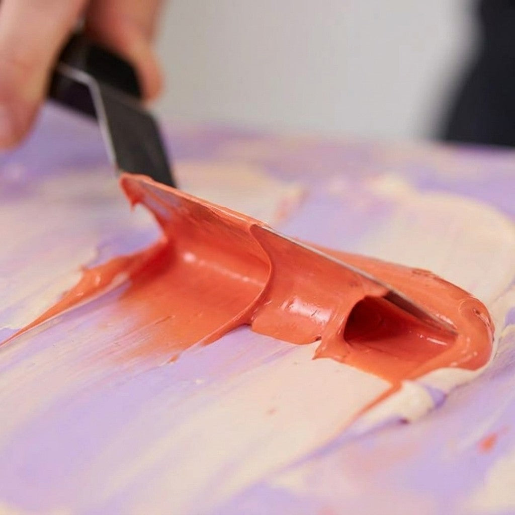 Brushible Artist Heavy Body acrylic — thick paint pulled with a palette knife
